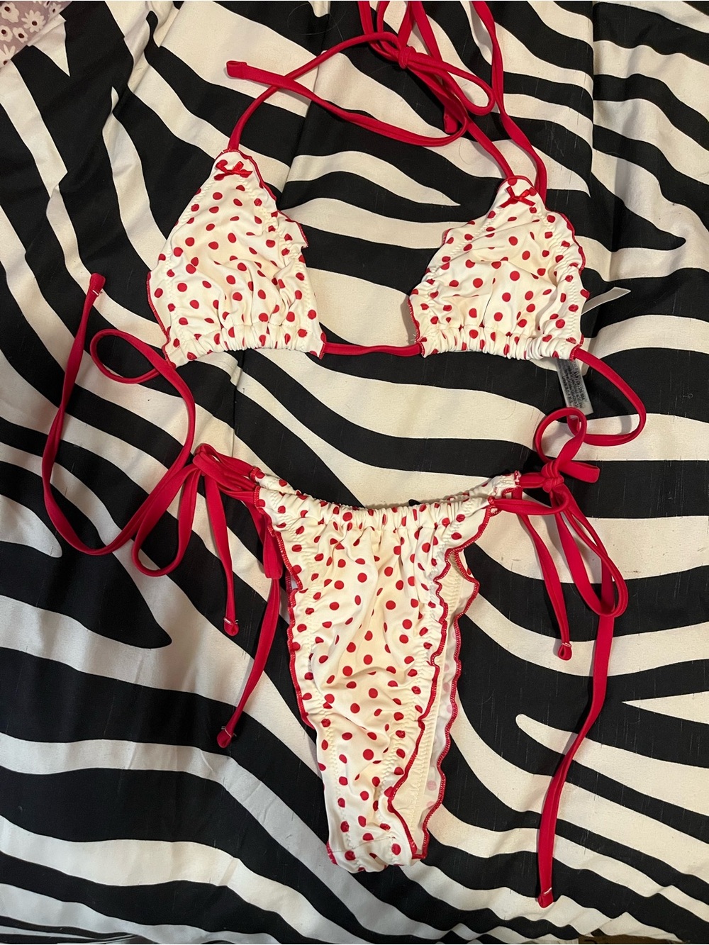 Cutie pie red and white polka dot bikini from Frankie’s bikinis x PINK